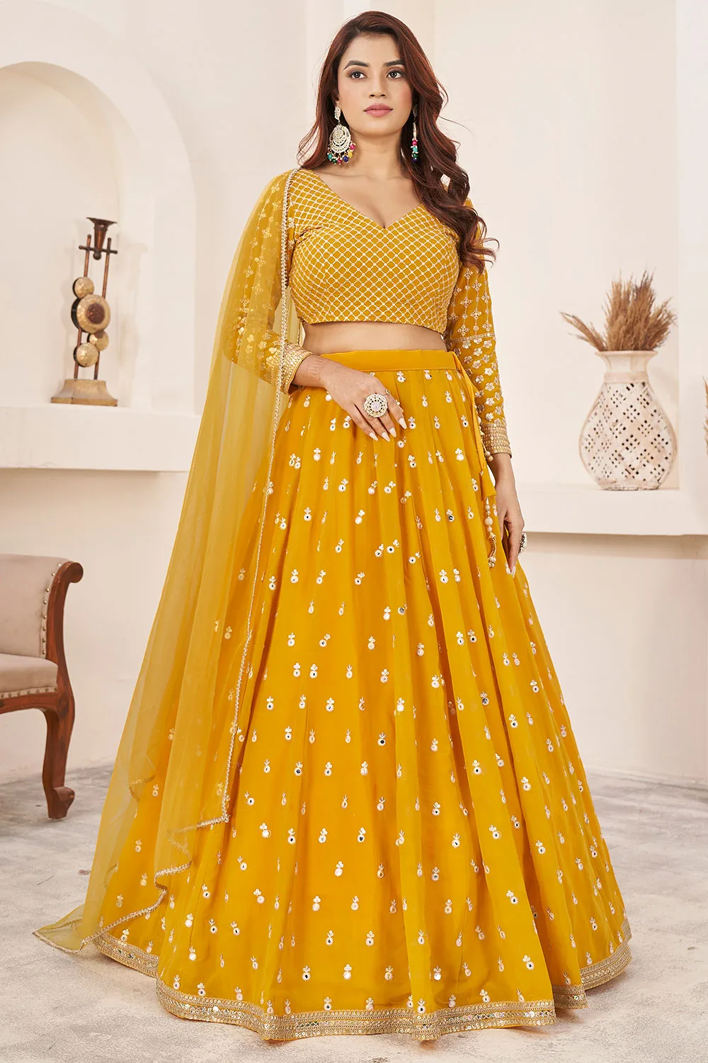 Splendid Yellow Georgette Lehenga Set with Sequins and Multi Colored Thread Zari Embroidery
