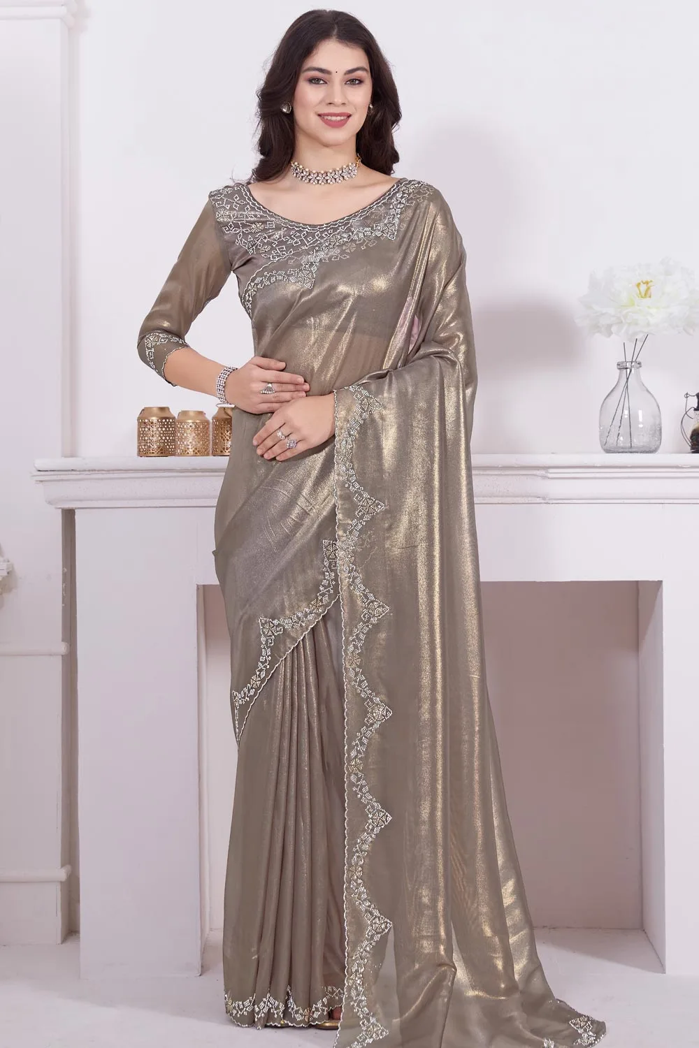 Fancy Beige Saree with Raina Net Coating Fabric and Dual-Colored Zircon Border