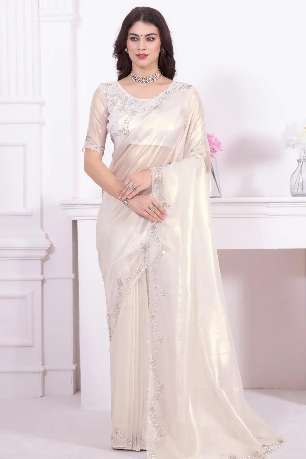 Fancy Off White Saree with Raina Net Coating Fabric and Dual-Colored Zircon Border