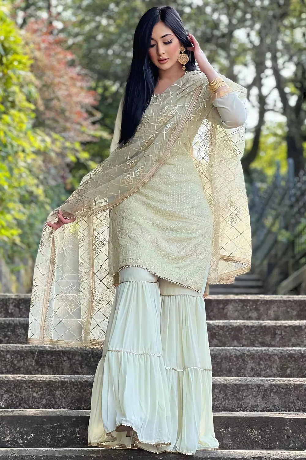 Cream Faux Georgette Sharara Suit with Sky Blue Embroidery