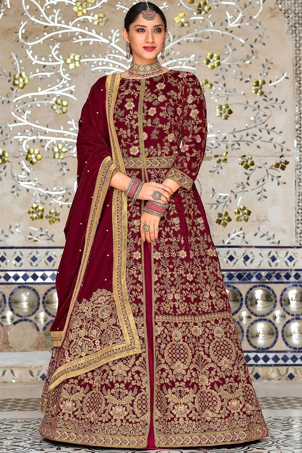Regal Maroon Velvet Anarkali Suit with Intricate Front Embroidery and Flowing Net Skirt
