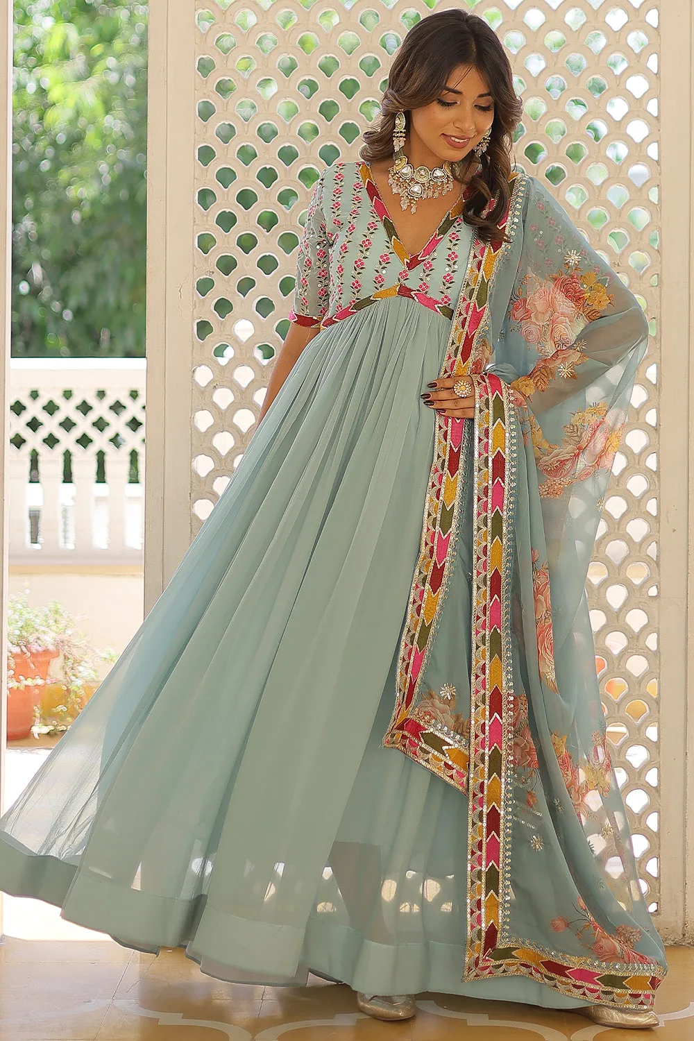 Sky Blue Faux Georgette Alia Cut Gown with Embroidery and Zari Sequins Work